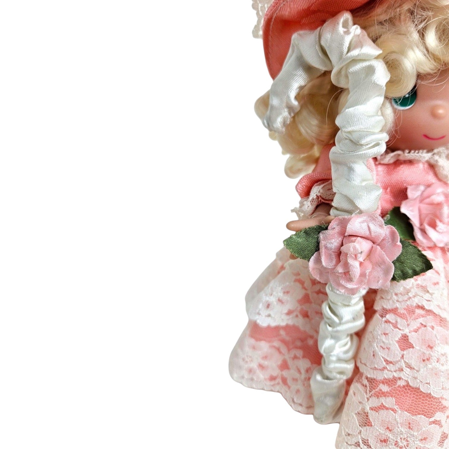 The Doll Maker Little Bo Peep 7-inch vinyl doll wearing a pink lace dress and bonnet, holding a white shepherd staff.