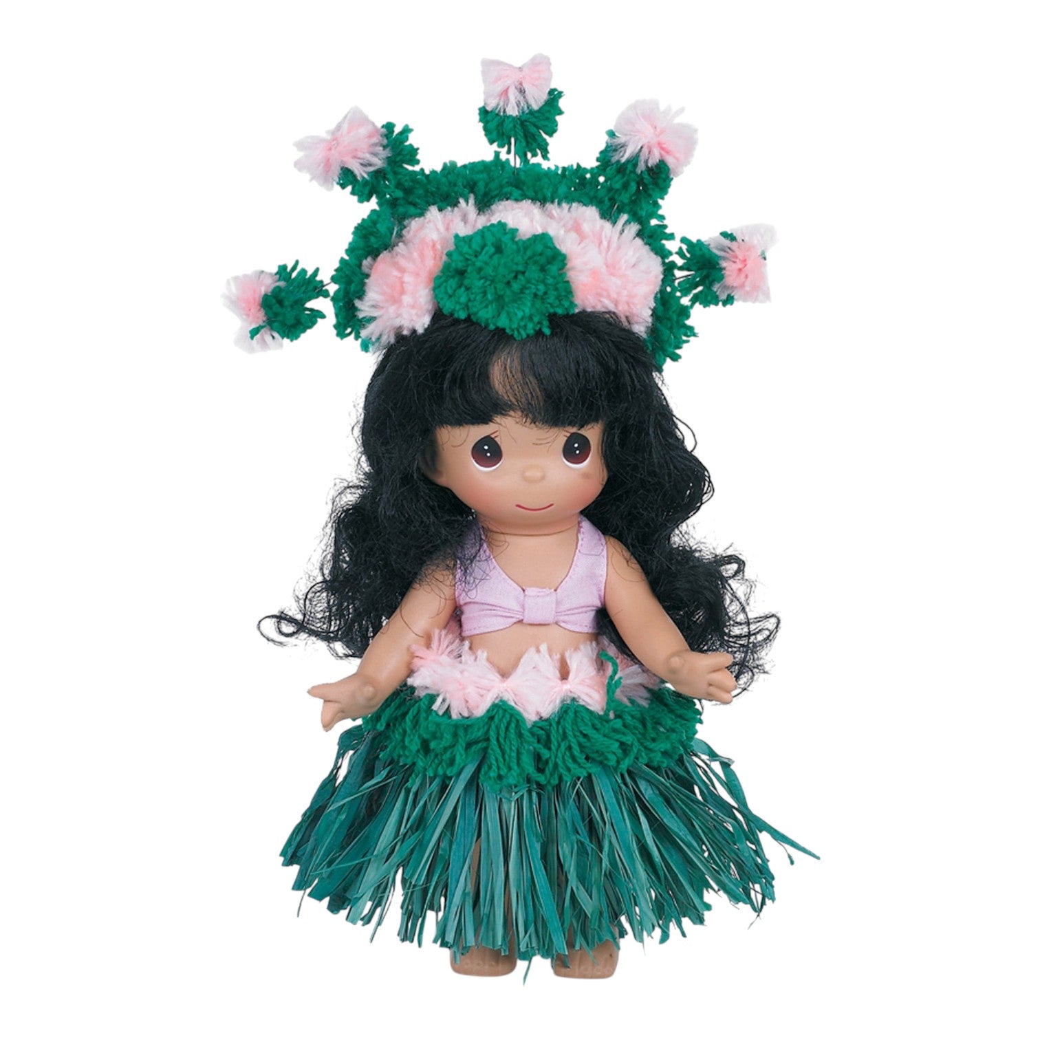 The Doll Maker Makamae 9 inch vinyl doll wearing a traditional Hawaiian hula outfit with a green and pink floral crown