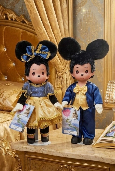The Doll Maker 50th anniversary Minnie and Mickey Mouse collector dolls in elegant blue and gold outfits