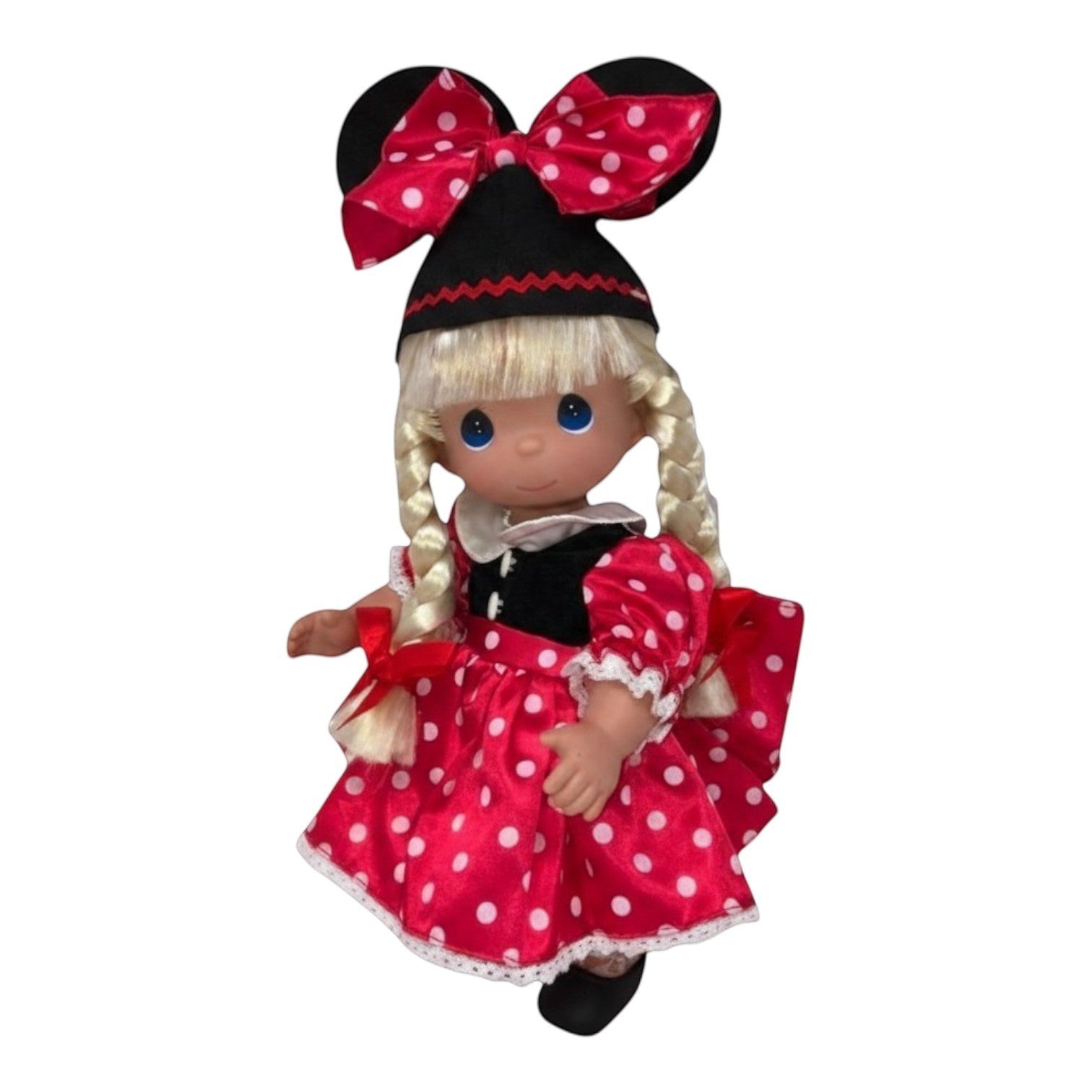 The Doll Maker 12-inch blonde Minnie Mouseketeer collectible doll wearing a red polka dot dress and mouse ear hat.
