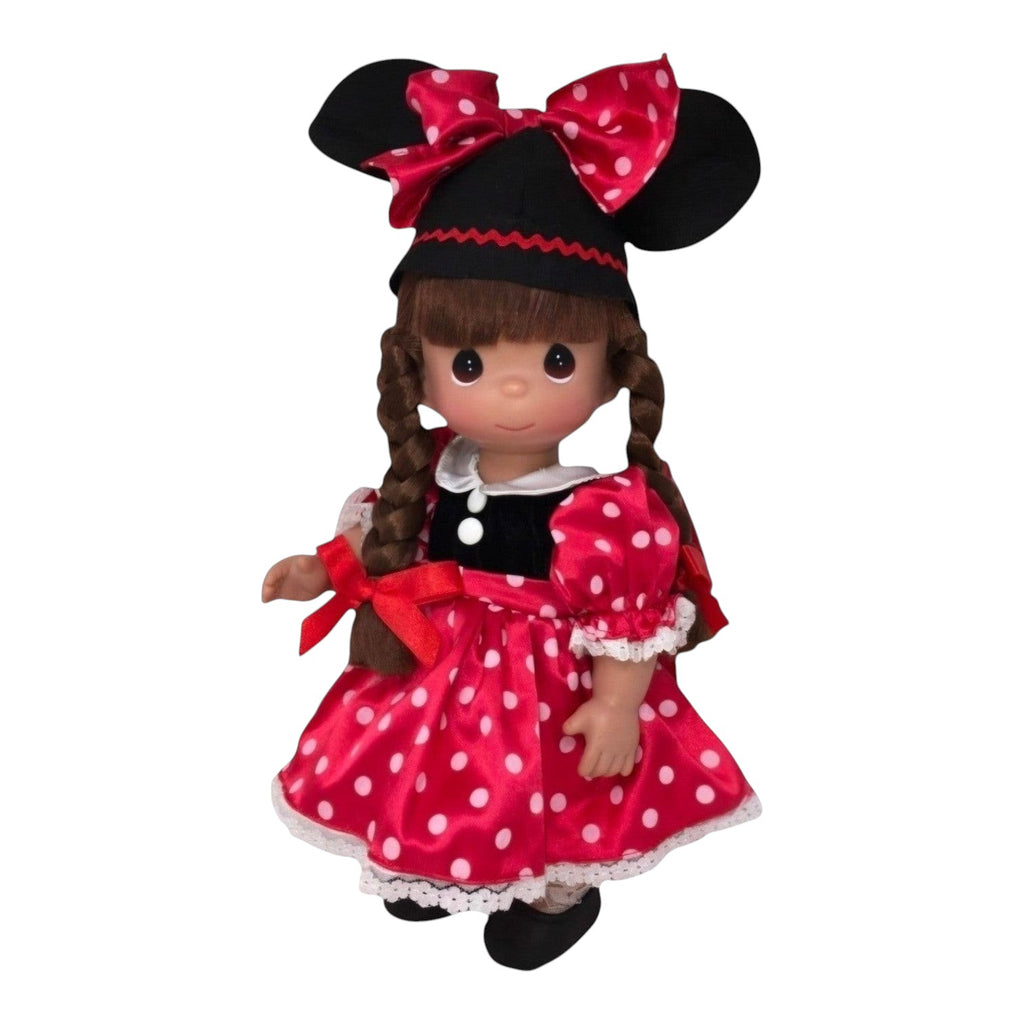 The Doll Maker 12-inch brunette Minnie Mouseketeer doll wearing a red polka dot dress and matching mouse ear hat.