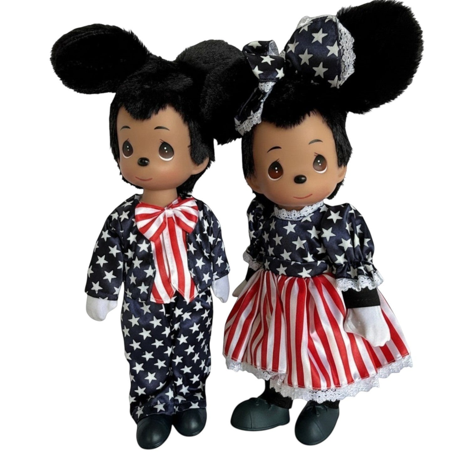 The Doll Maker 12-inch Patriotic Mickey and Minnie dolls wearing red, white, and blue star-and-stripe outfits.