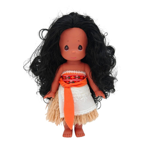 The Doll Maker 12-inch Polynesian Princess doll with long black hair, traditional island attire, and grass skirt.