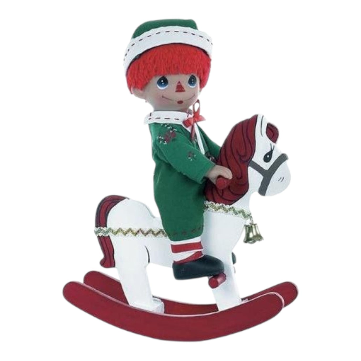 The Doll Maker 9-inch Raggedy Andy Christmas vinyl doll wearing a green elf outfit, riding a white rocking horse.