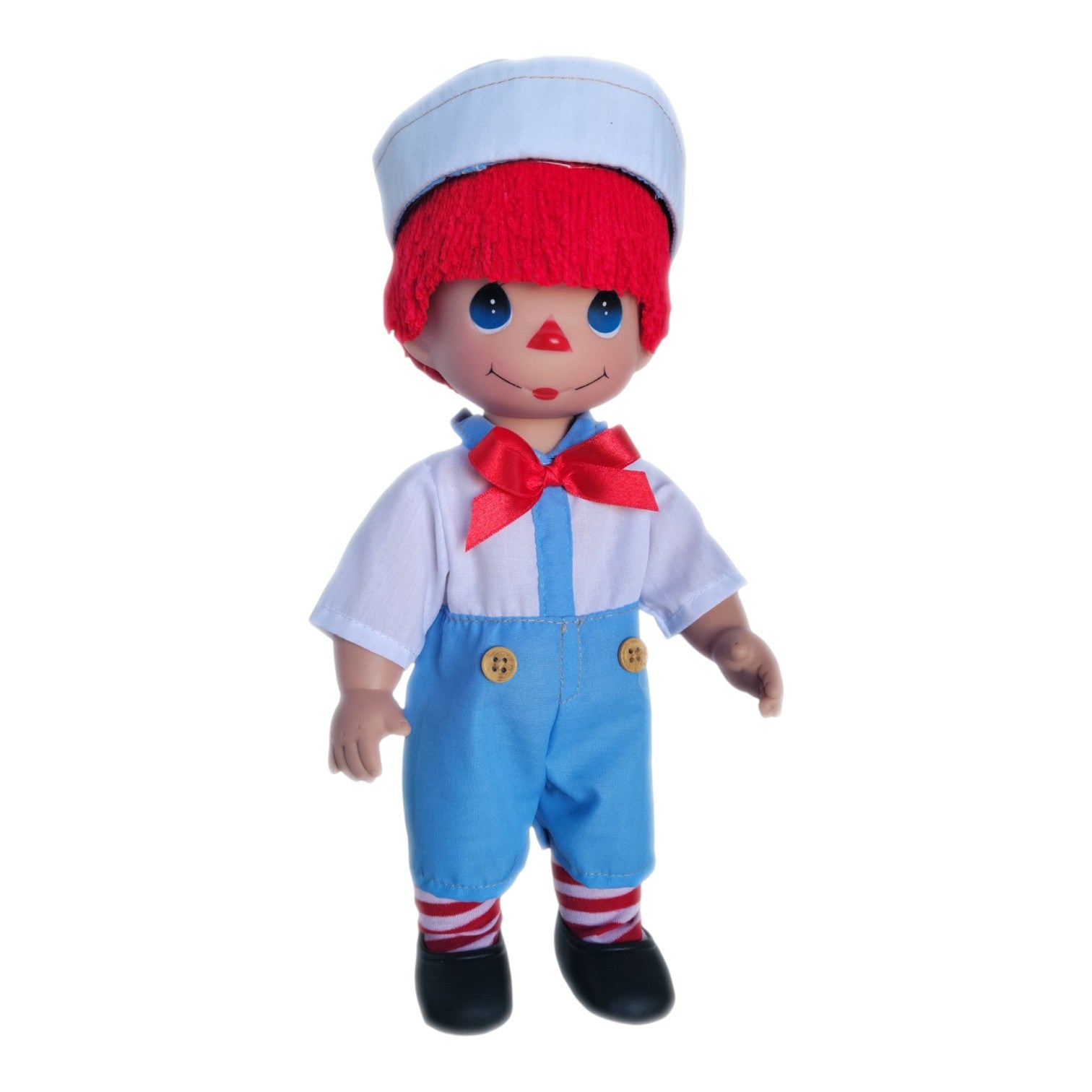 The Doll Maker 12-inch Raggedy Andy vinyl doll with bright red hair, sailor hat, and blue overalls by Linda Rick.