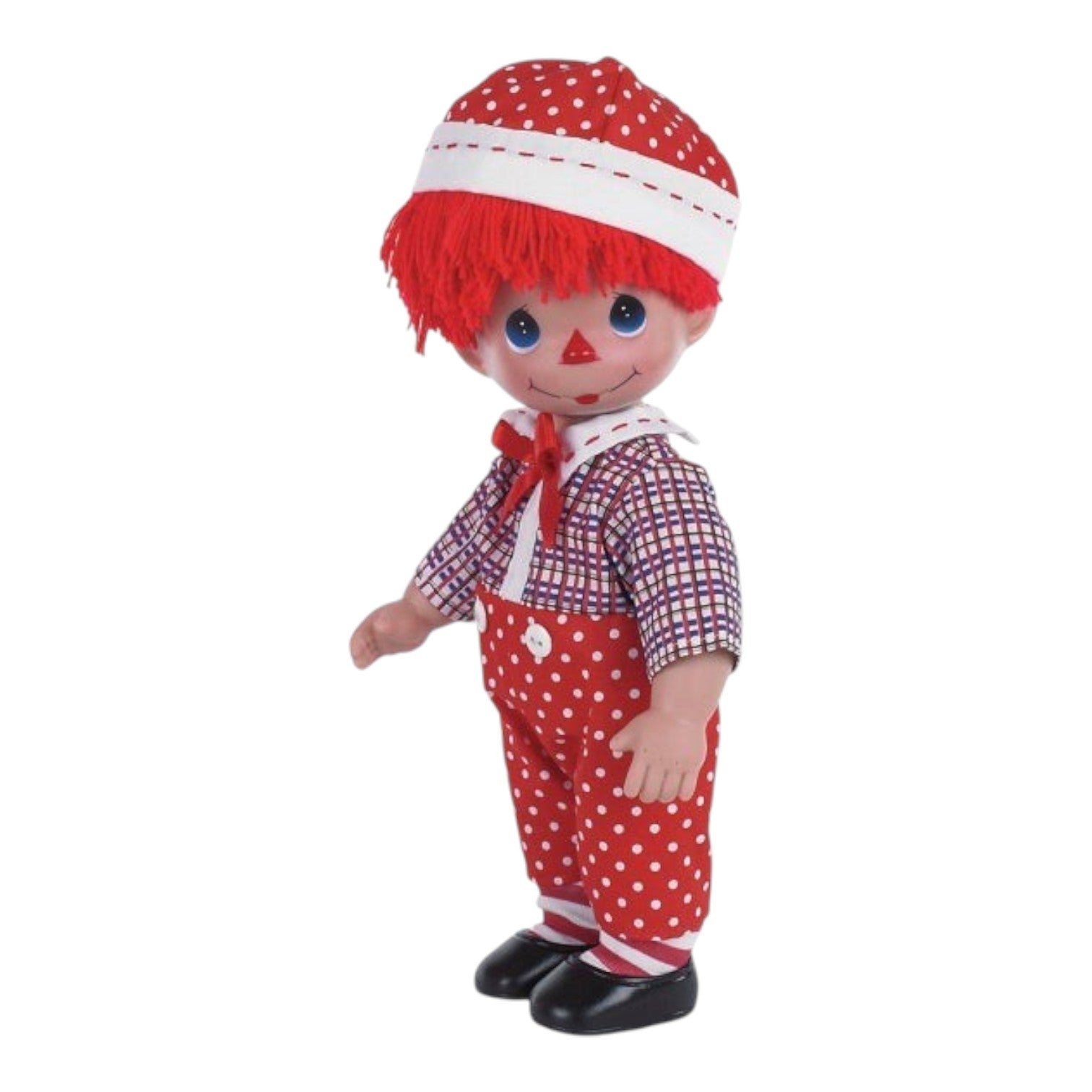 The Doll Maker 12-inch Raggedy Andy vinyl doll wearing a red and white polka dot outfit and matching hat