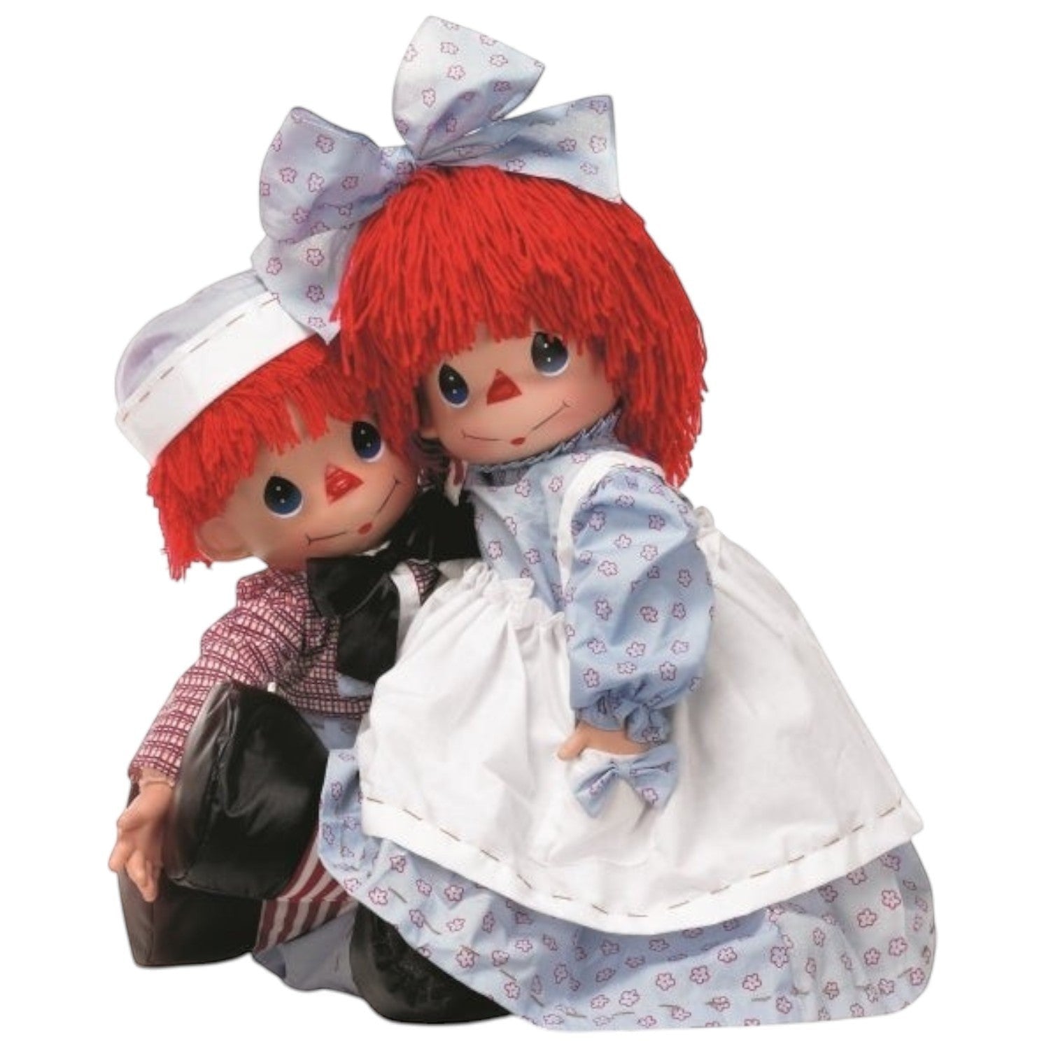 The Doll Maker 26-inch Raggedy Ann and Andy vinyl dolls with soft bodies and classic floral outfits