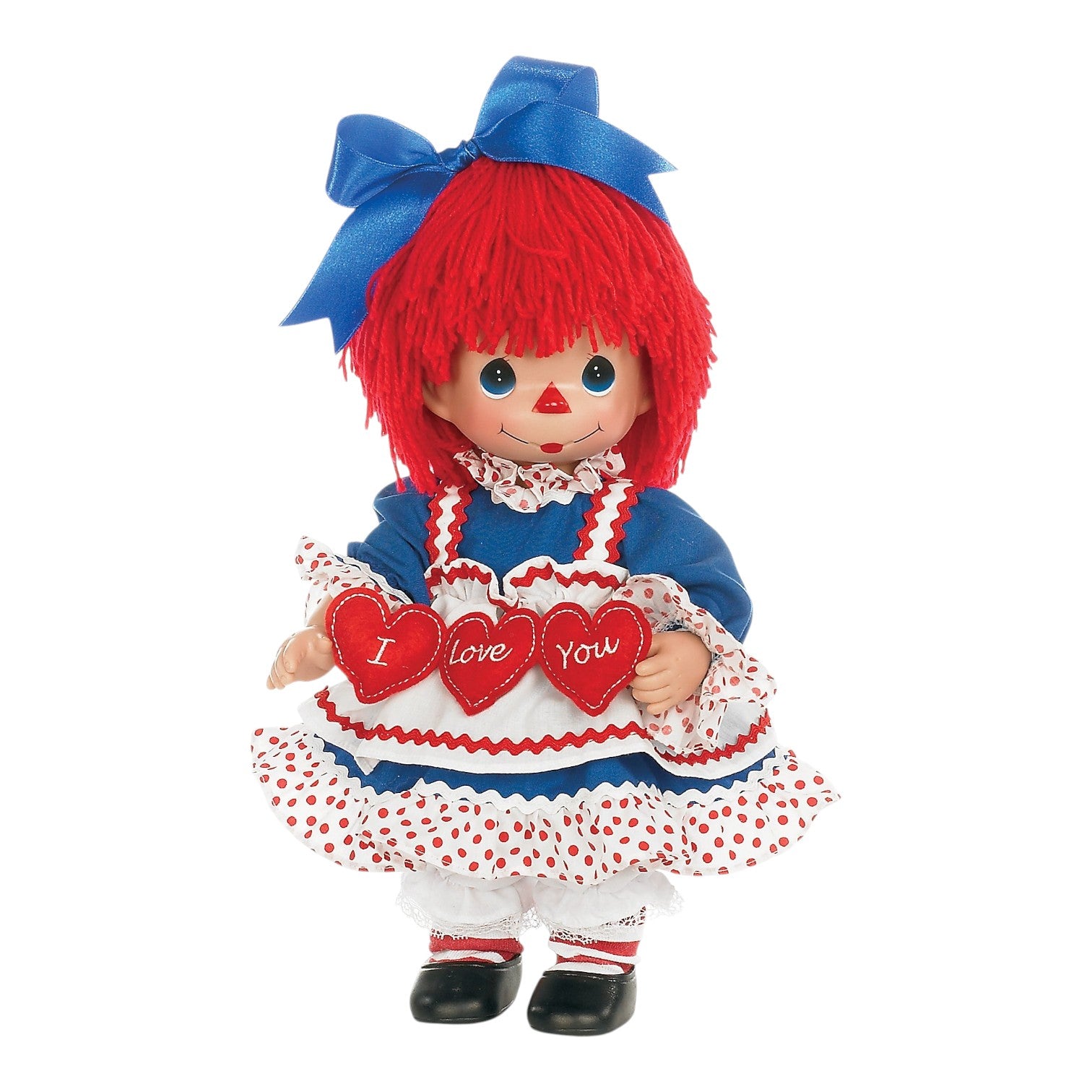 The Doll Maker 12-inch Raggedy Ann vinyl doll wearing a blue and red dress, holding three red hearts with I Love You.