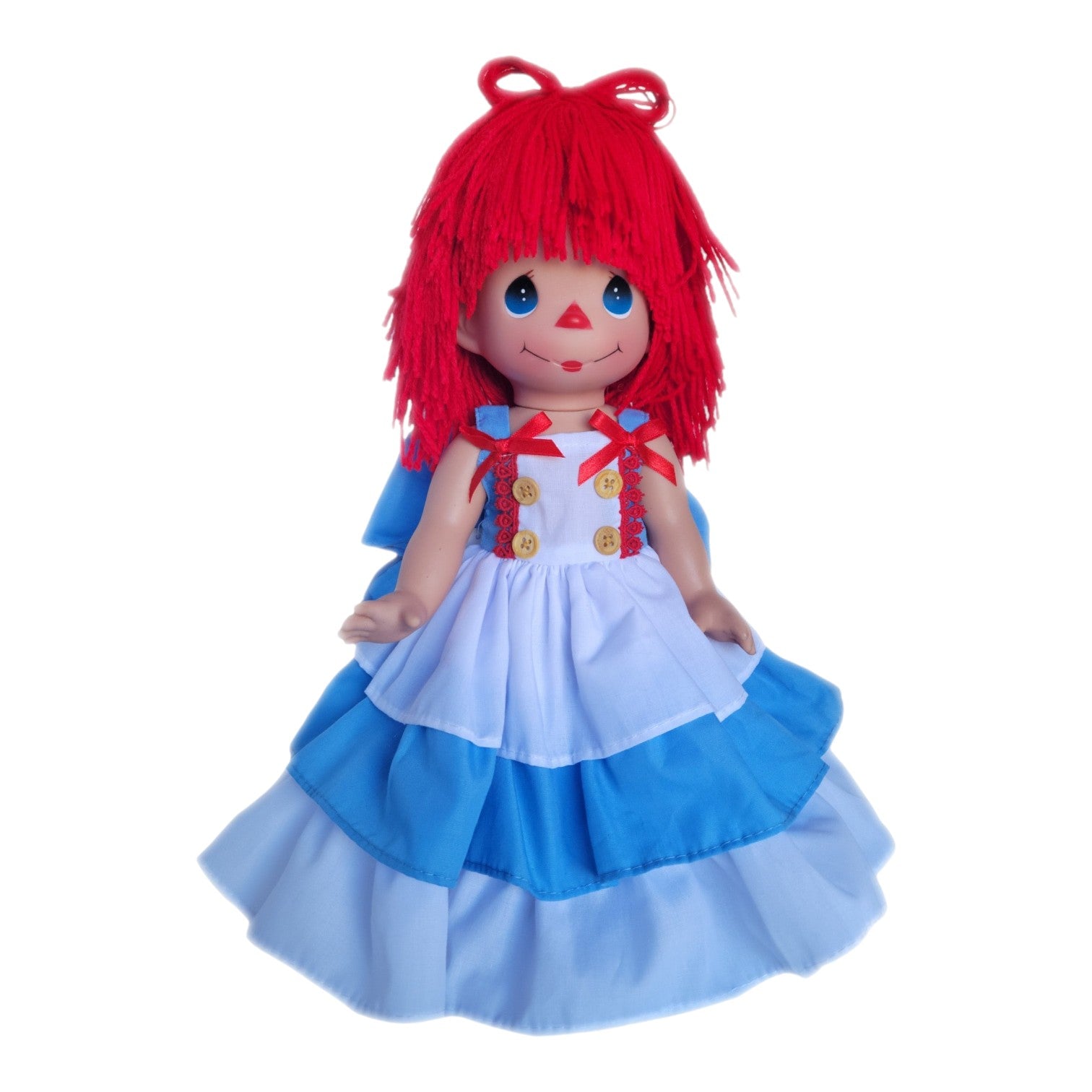 The Doll Maker Dancing Into Your Heart 12-inch Raggedy Ann vinyl doll wearing a ruffled white and blue dress.