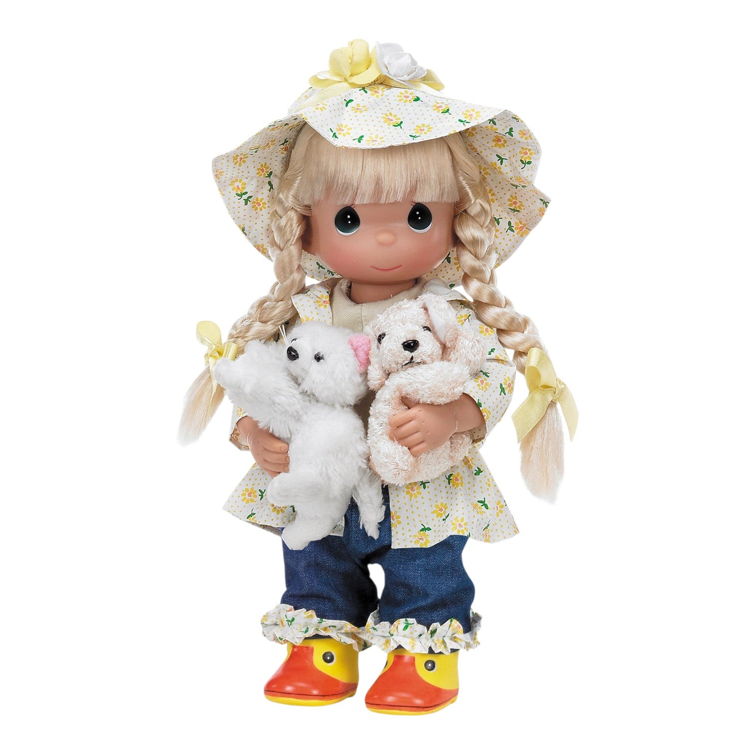 The Doll Maker 12 inch vinyl doll wearing a floral rain hat, coat, and rubber ducky boots holding two plush pets.