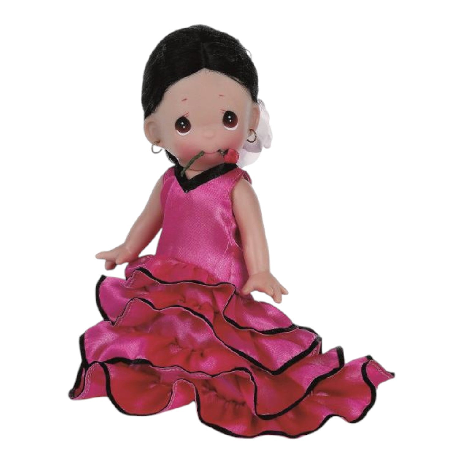 The Doll Maker Sancia 9-inch vinyl doll from Spain wearing a pink flamenco dress with black trim and a red flower
