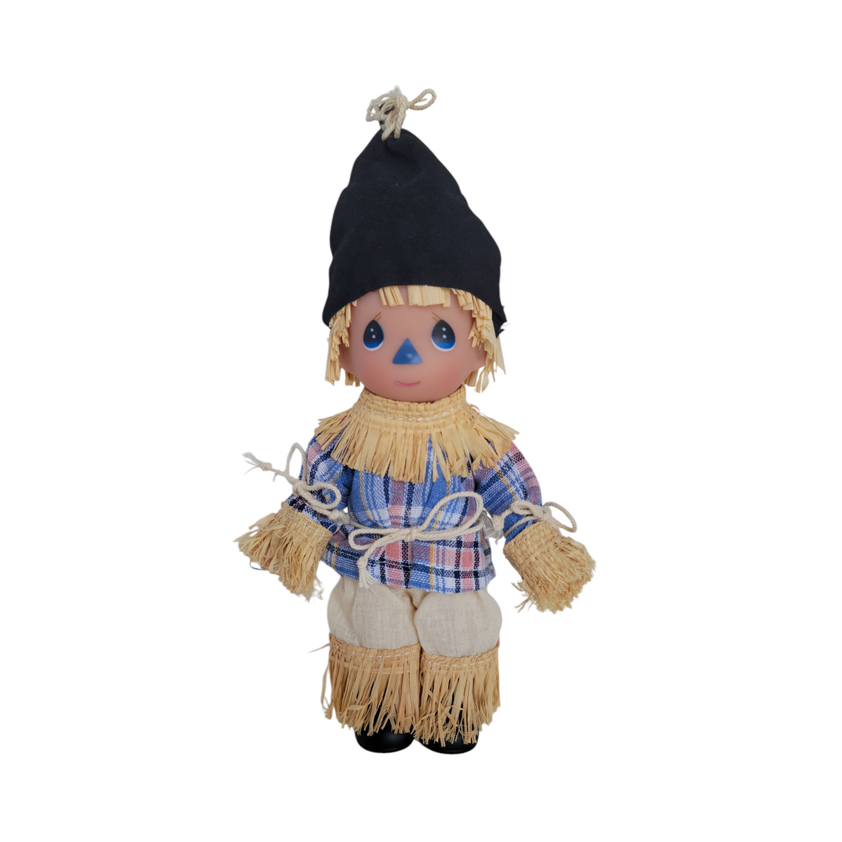 The Doll Maker 7-inch Scarecrow vinyl doll from The Wizard of Oz wearing a plaid shirt and black hat