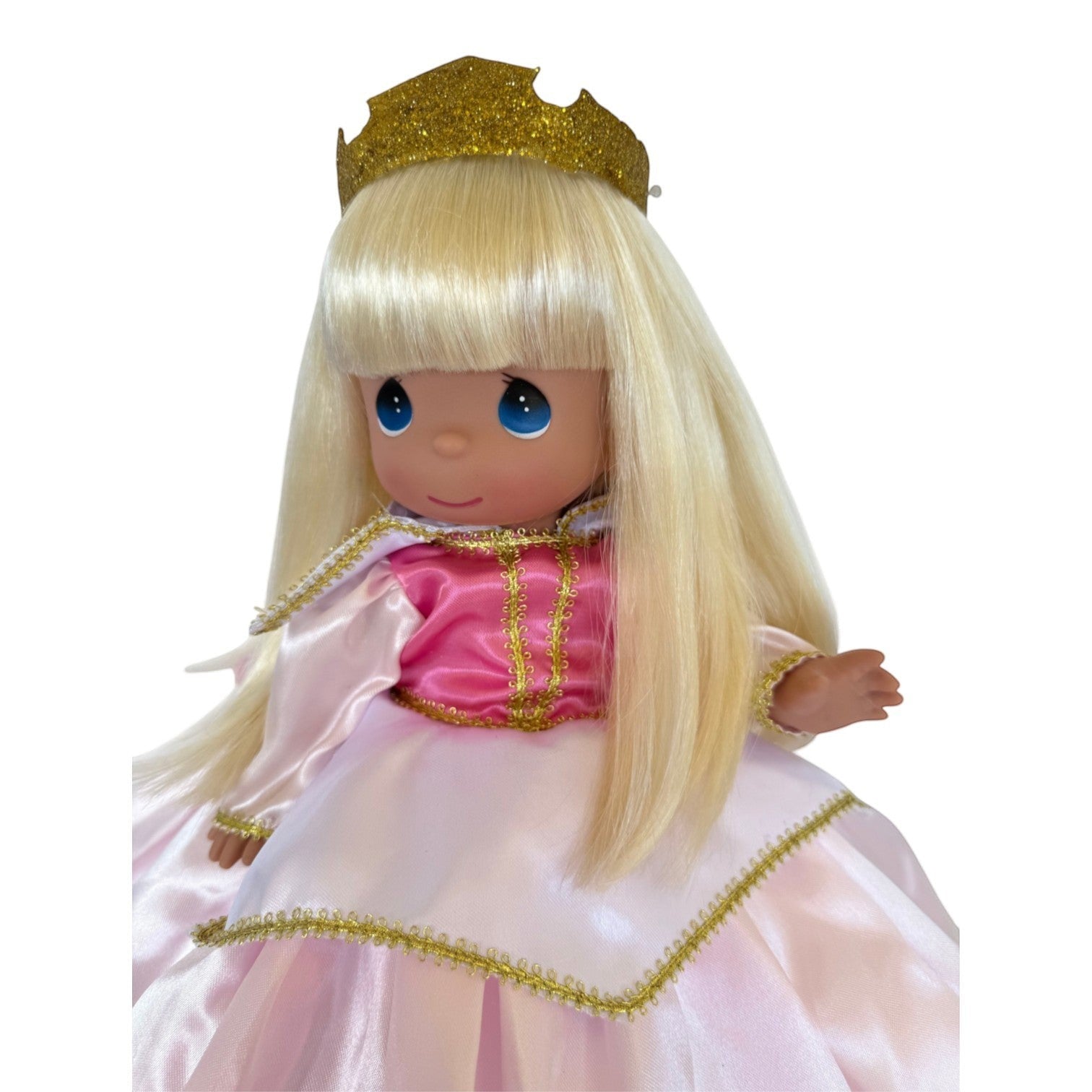 The Doll Maker 12-inch Sleeping Beauty doll with blonde hair, blue eyes, gold glitter crown, and pink satin dress.