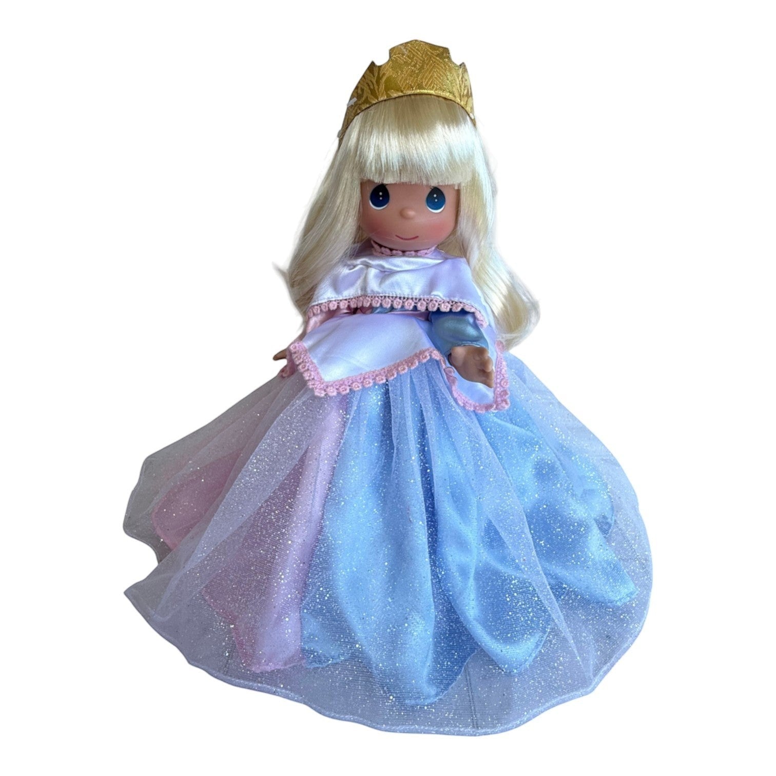 The Doll Maker 12-inch Sleeping Beauty doll with blonde hair, gold crown, and a sparkling pink and blue princess gown.