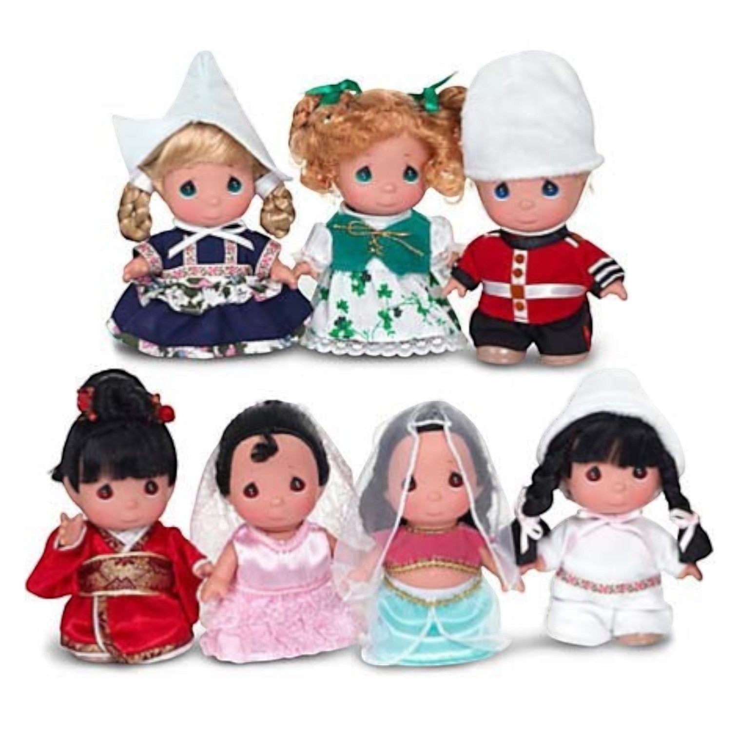 The Doll Maker 7-piece Small World doll set featuring 5-inch dolls in traditional international cultural outfits. Holland, Ireland, England, Japan, Spain, India, Iceland