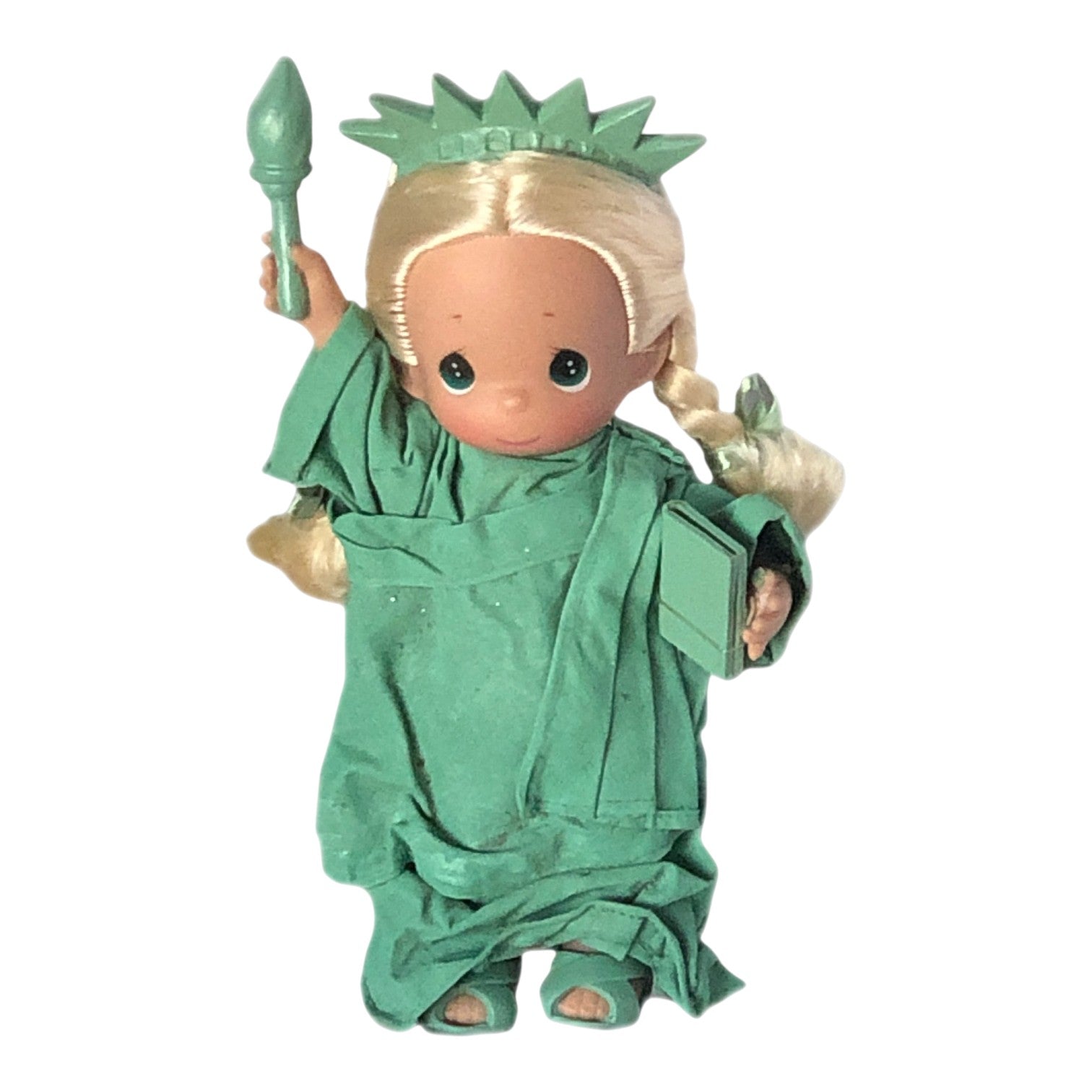 The Doll Maker 9-inch blonde vinyl Statue of Liberty doll wearing a green gown and crown with a torch and tablet