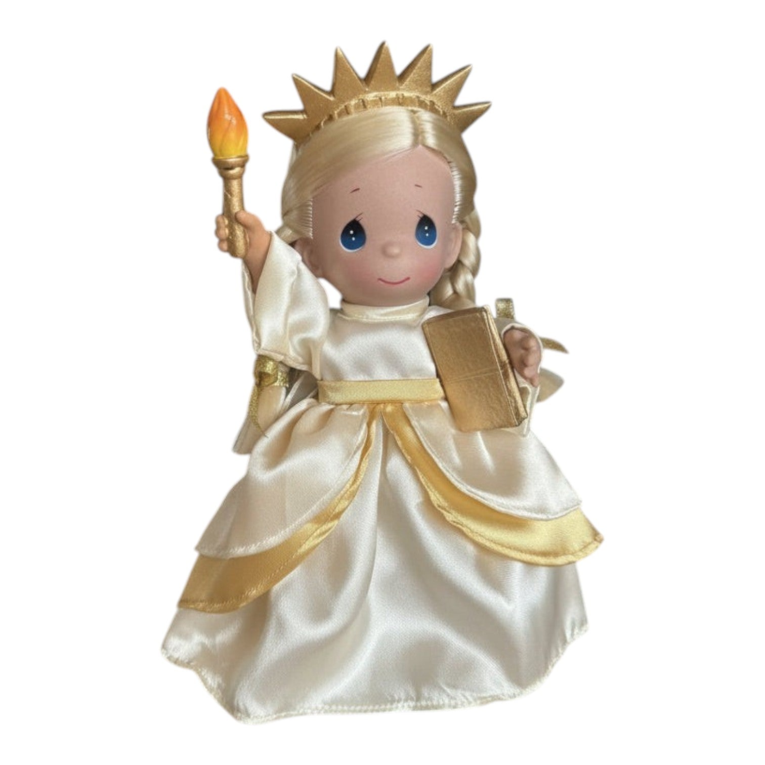 The Doll Maker 9-inch Statue of Liberty doll in an ivory and gold dress, holding a torch and book for USA anniversary.