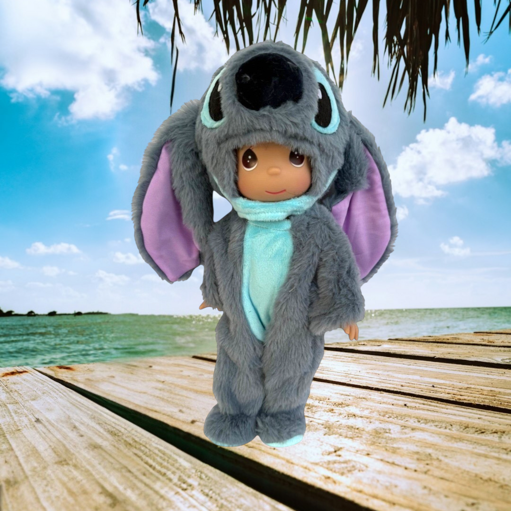 The Doll Maker 12-inch vinyl doll wearing a fluffy grey and blue Stitch costume with oversized ears and plush fabric.