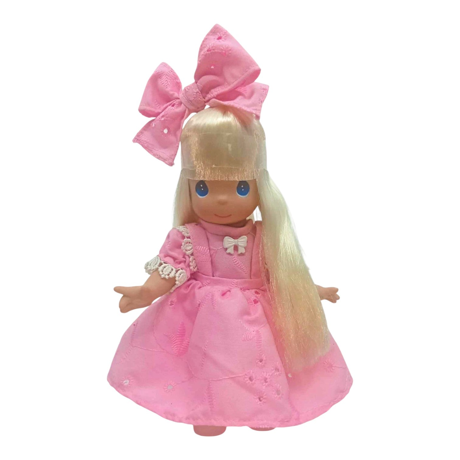 The Doll Maker Tammy 9-inch collector doll with long blonde hair wearing a pink embroidered dress and matching bow