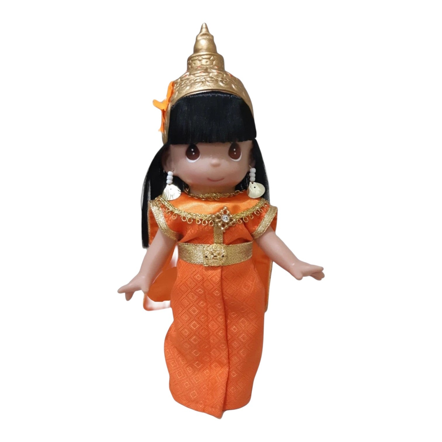 The Doll Maker 9-inch Thailand Dao doll wearing a traditional orange dress with gold accents and a pointed headpiece.