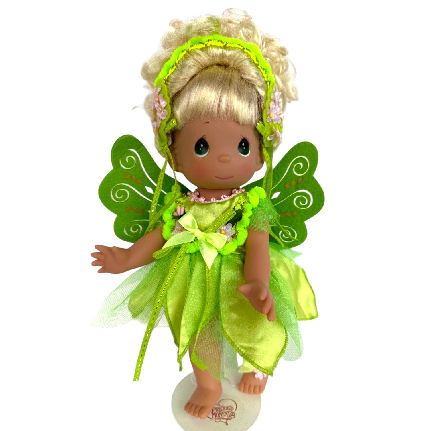 The Doll Maker 12-inch Tinker Bell collectible doll wearing a sparkling green fairy dress and delicate wings.