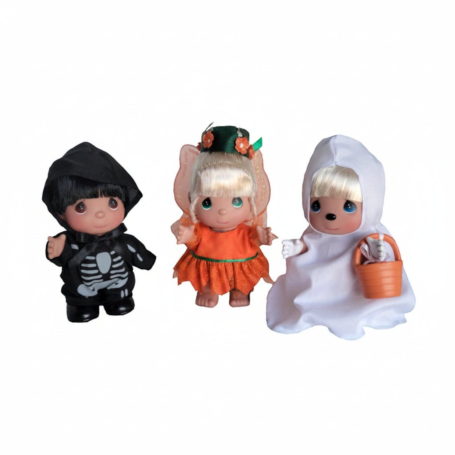 The Doll Maker Trick or Treat set featuring three 5-inch Precious Moments vinyl dolls in Halloween costumes