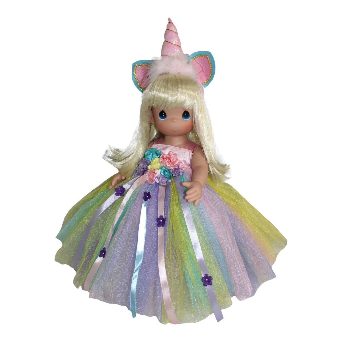 The Doll Maker 16-inch limited edition vinyl unicorn doll with blonde hair and a pastel rainbow tulle gown.