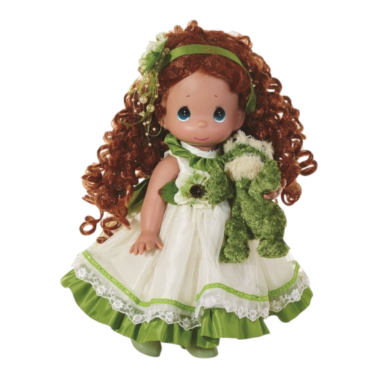 The Doll Maker 12-inch vinyl doll with curly red hair wearing a green and white floral dress holding a toy frog