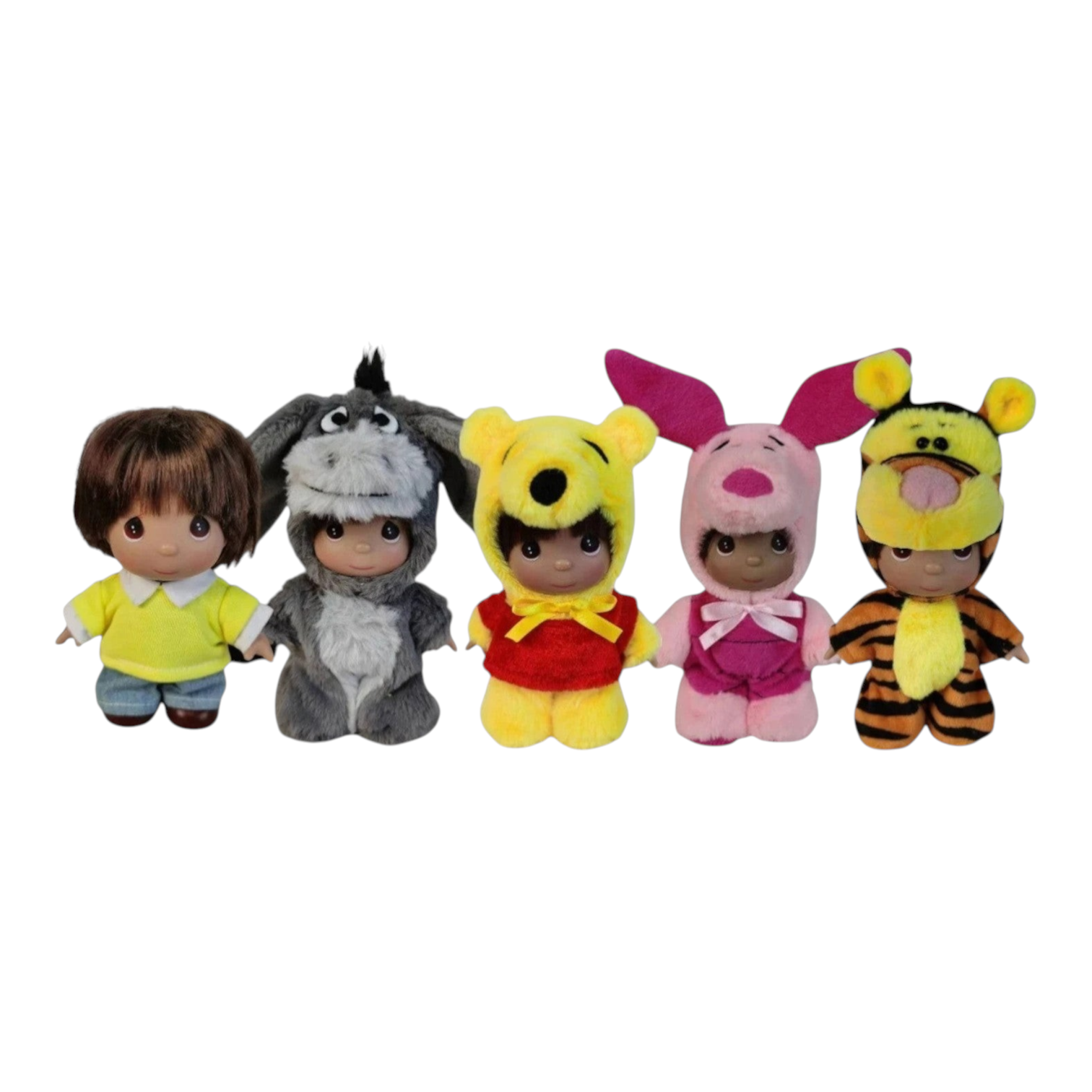 The Doll Maker Winnie the Pooh set featuring five 5-inch collectible dolls dressed as Christopher Robin and friends.