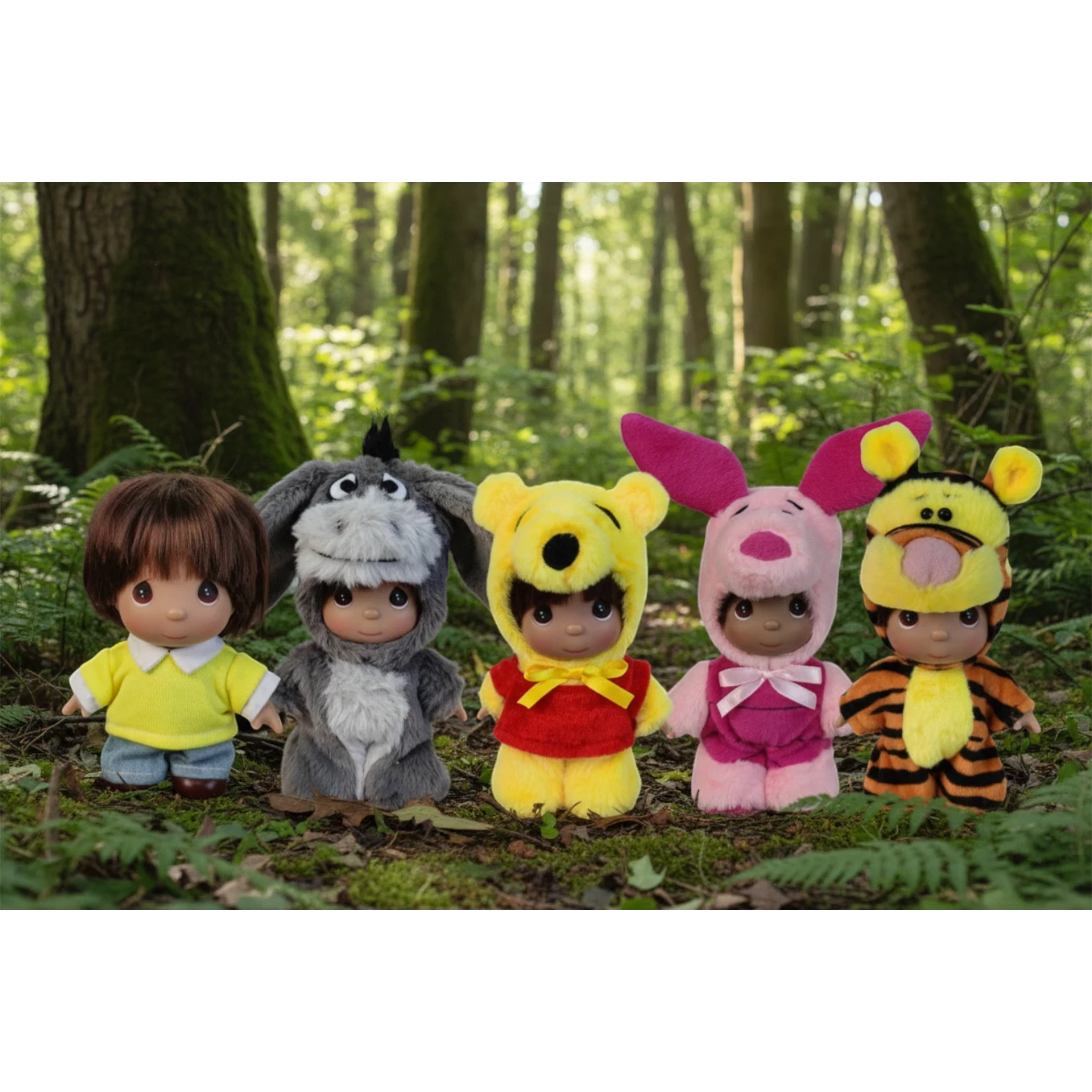 The Doll Maker Winnie the Pooh set featuring five 5-inch collectible dolls dressed in character costumes in a forest.