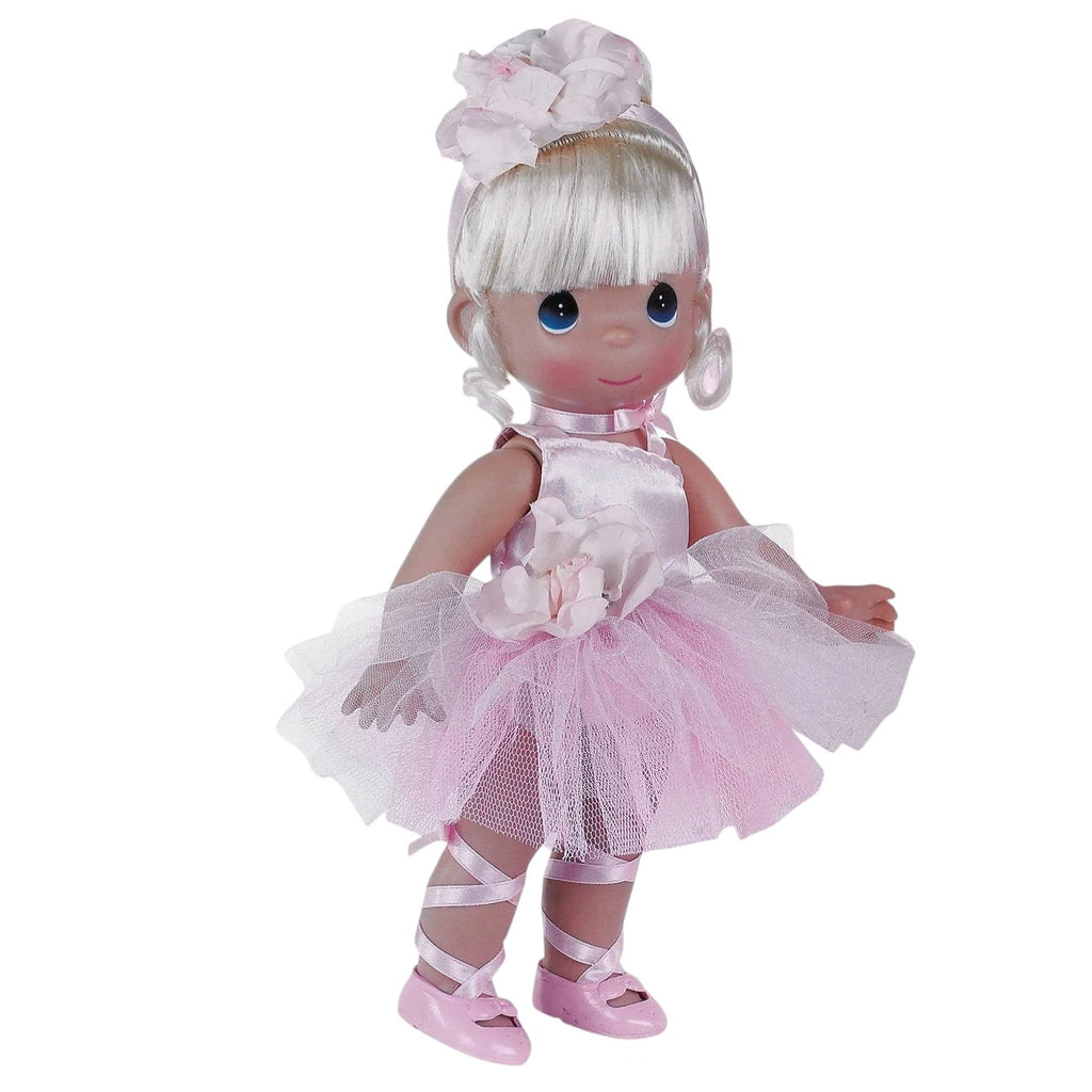 The Doll Maker's Ballerina Bliss blonde doll in a pink satin tutu with ribbon-tied ballet slippers.